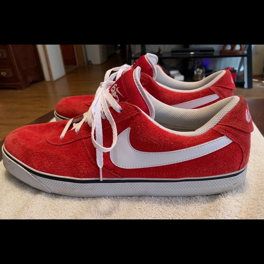 Men’s red and white Nike size 13